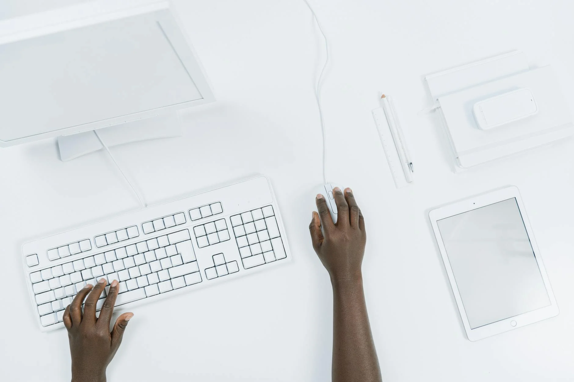 Man using a Computer in white background
